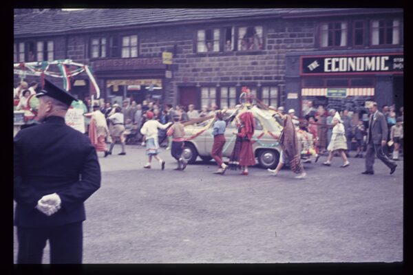 This is in St Georges Square, Hebden Bridge. This photo was taken in the 1960s by William Edmondson and was donated by his family.