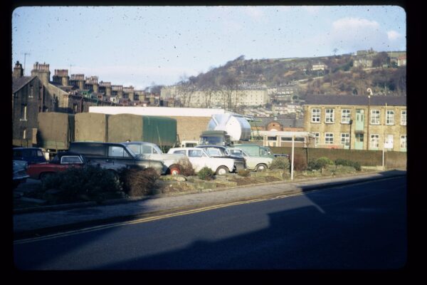 The car park at Valley Road, Hebden Bridge. When there was not a Market, vehicles could park on the site. This photo was taken in the 1960s by William Edmondson and was donated by his family.